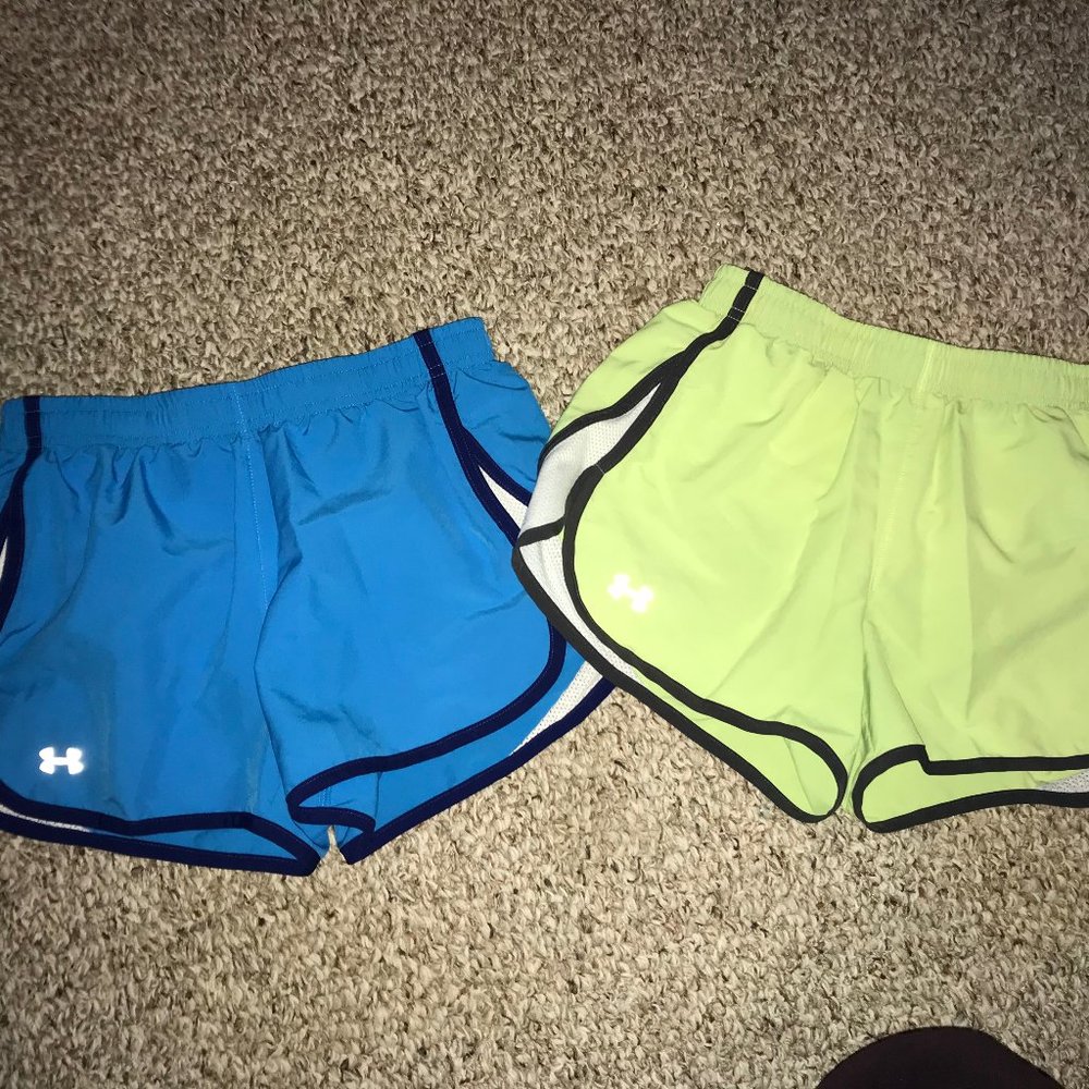 Two pairs of underarmor running shorts
